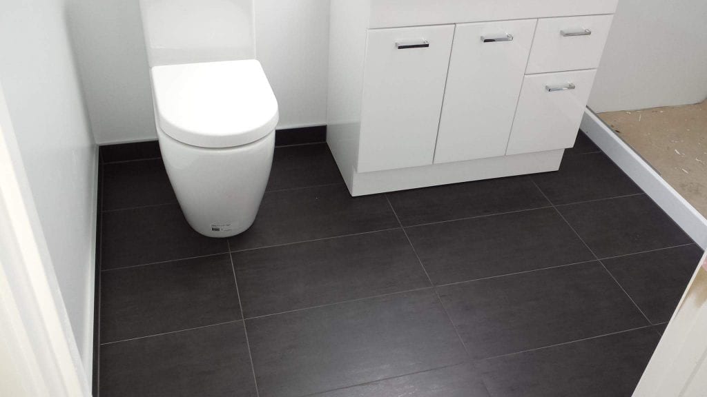 Dark tile bathroom