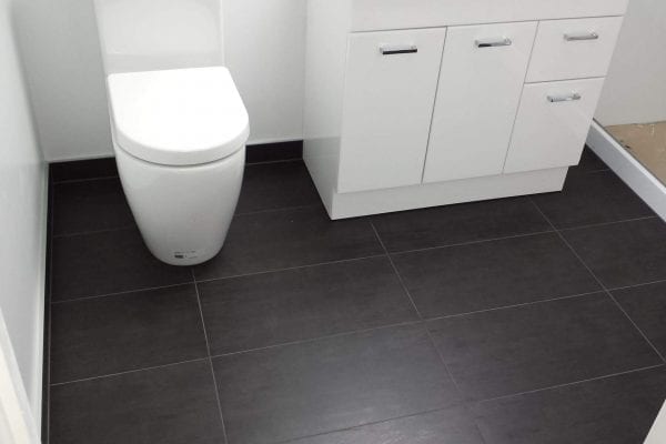 Dark tile bathroom