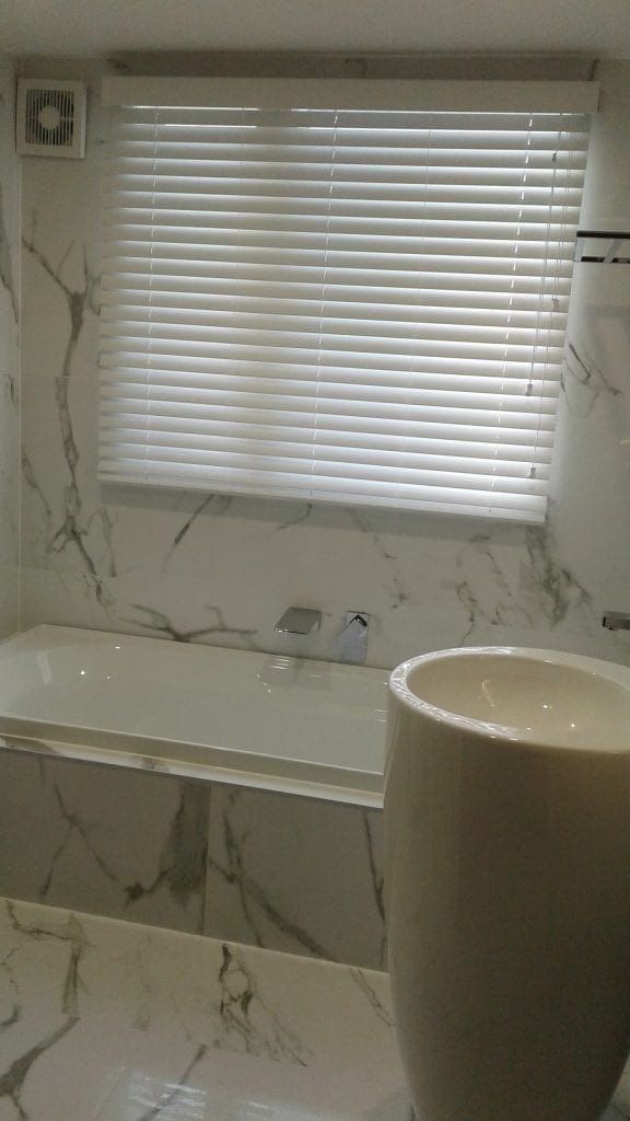 Marble tiled bathroom